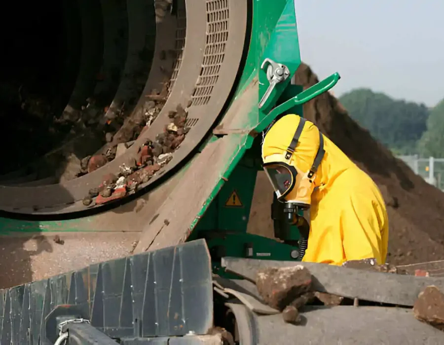 Worker in Hazmat Suit at Debris Removal Site