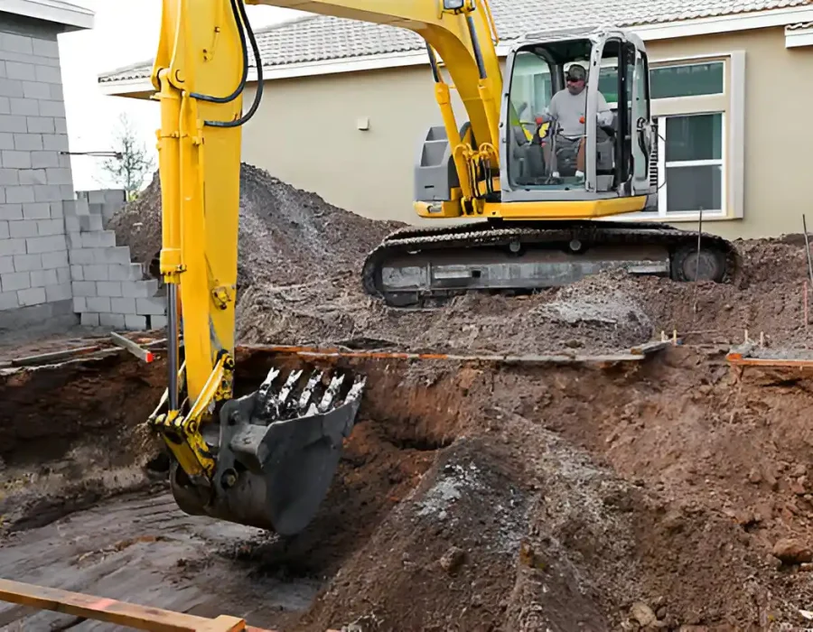 Excavator Digging Foundation in Residential Area