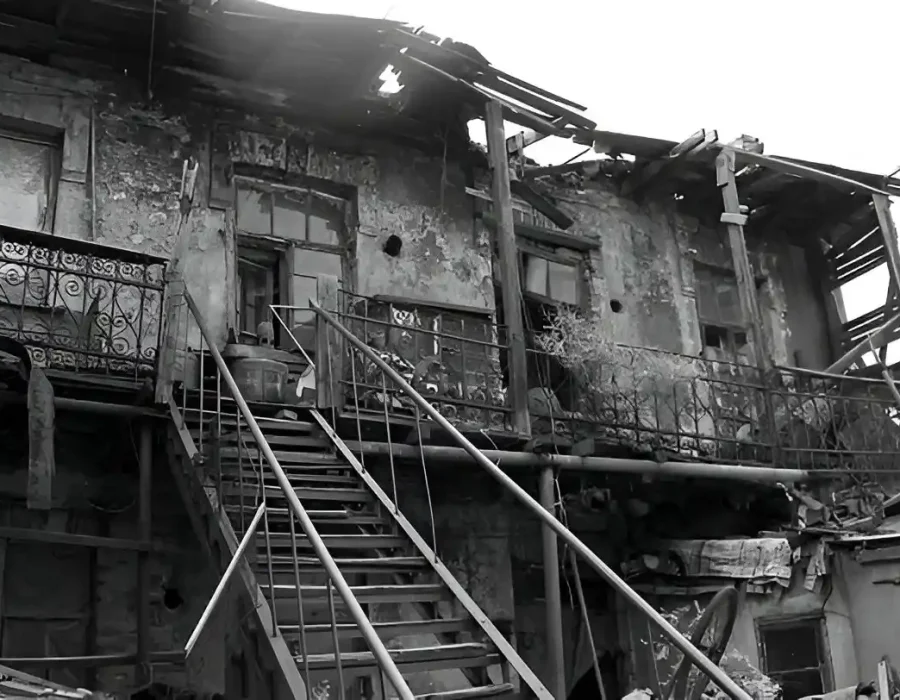 Decaying Structure with Exposed Walls and Debris Accumulation