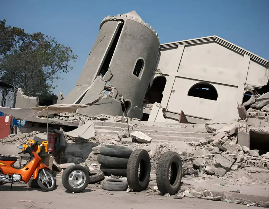 Tilted Structure with Debris and Equipment at Demolition Site