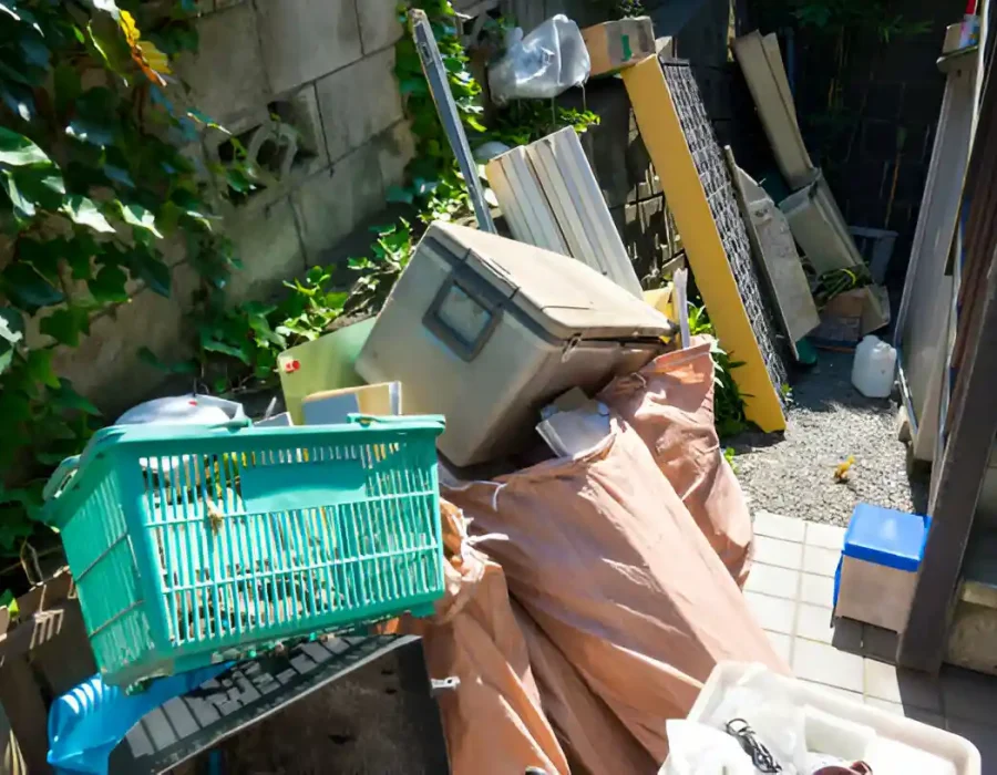 Outdoor collection of household waste and debris ready for professional removal service