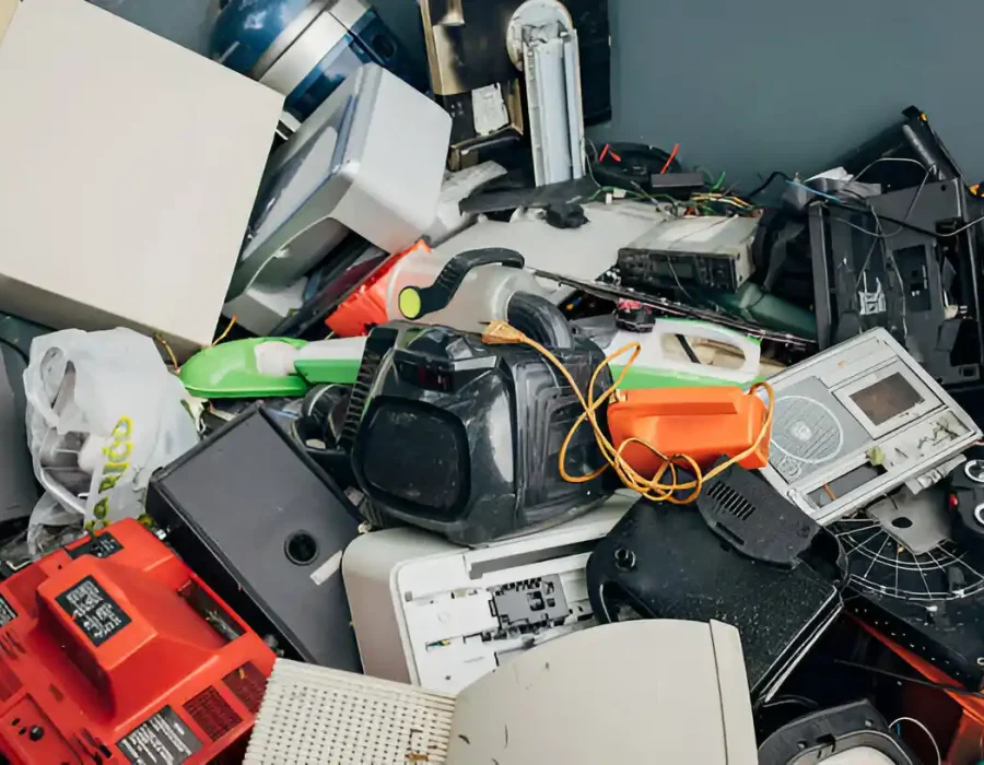 Pile of obsolete electronics and devices requiring professional e-waste disposal and recycling