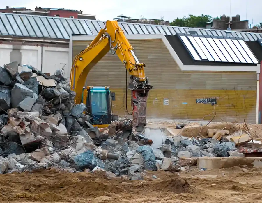 Excavator Breaking Concrete for Demolition