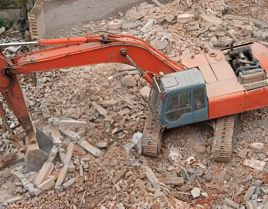 Heavy Excavator Clearing Demolition Site Rubble
