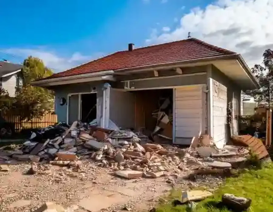 Demolished house with debris for removal services
