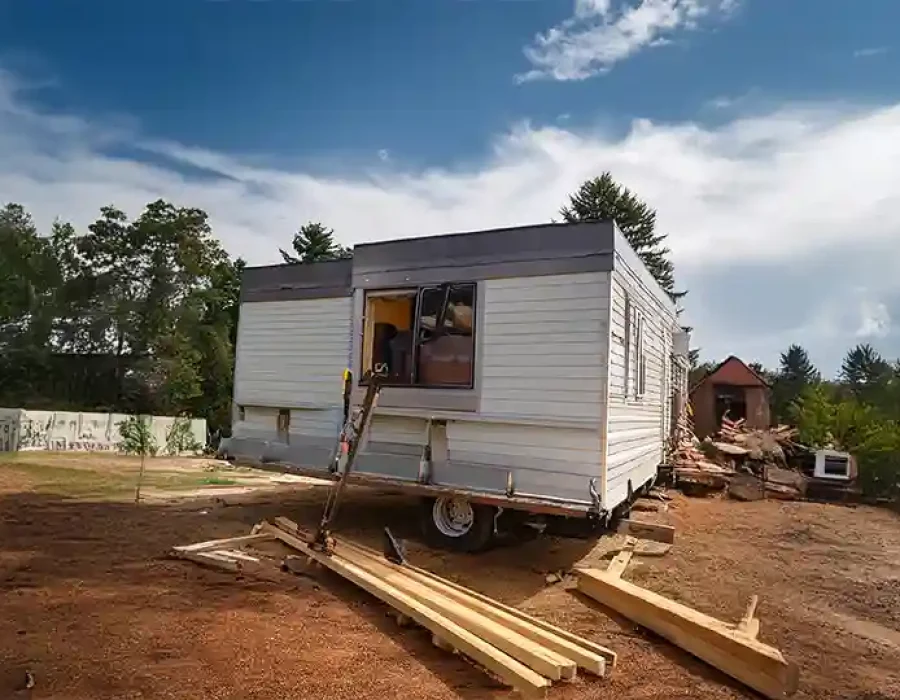 Professional team and machinery performing demolition and site cleanup efficiently.