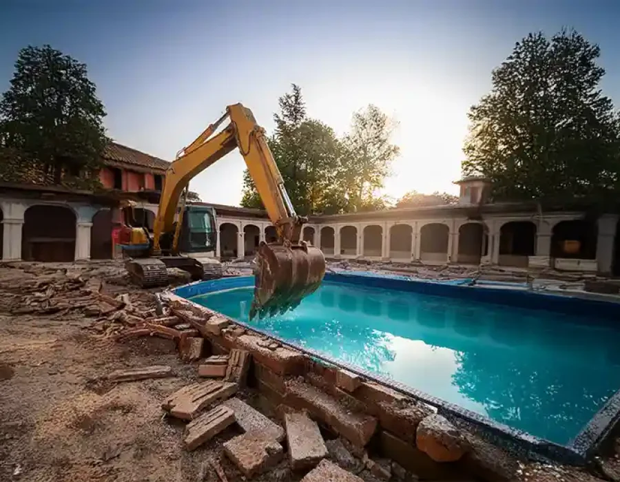 Expert demolition crew clearing debris and preparing site for cleanup and removal services.