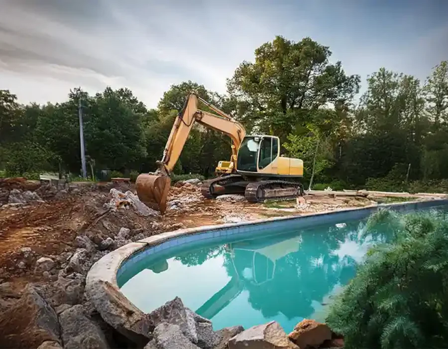 Professional demolition crew performing debris removal and site preparation for cleanup services.