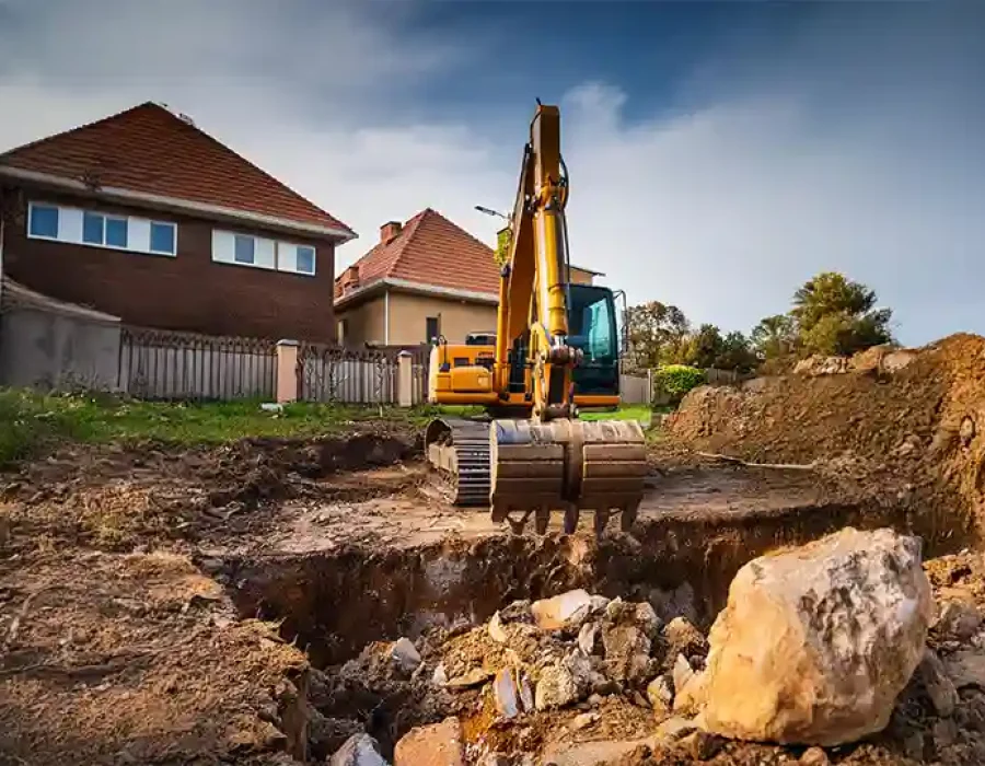 Excavator Preparing Residential Demolition Site