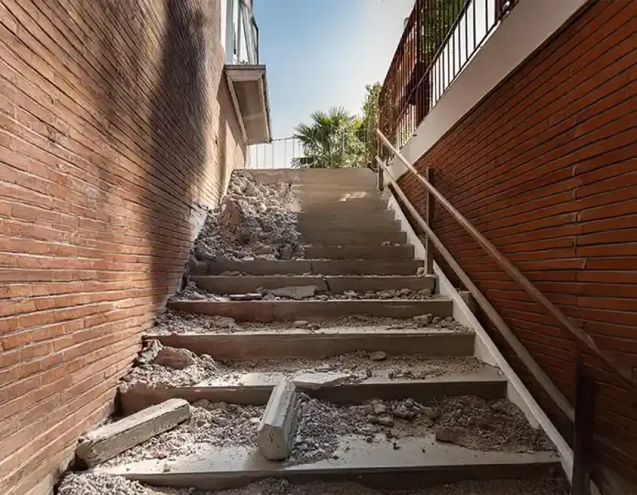 Damaged outdoor stairs with debris for removal service