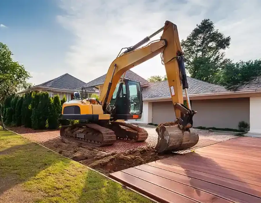Heavy equipment clearing debris during professional demolition and cleanup work.