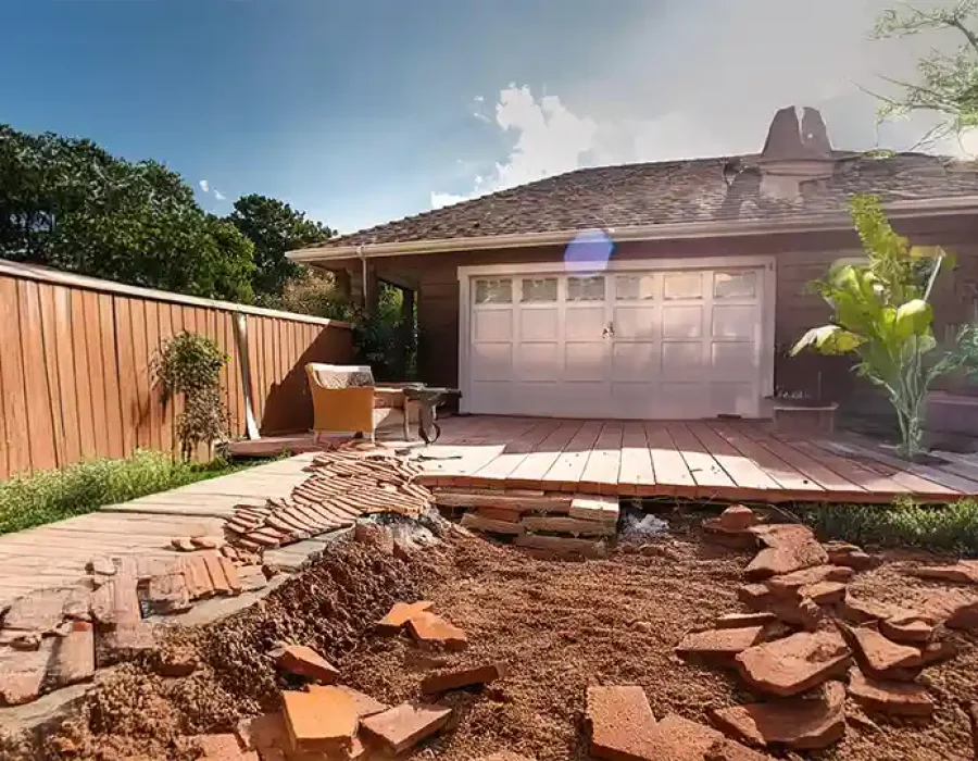Heavy machinery clearing debris during demolition and site preparation services.