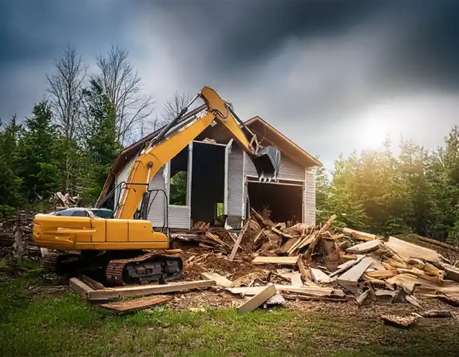 Skilled workers and machinery performing demolition and debris removal for efficient site preparation.